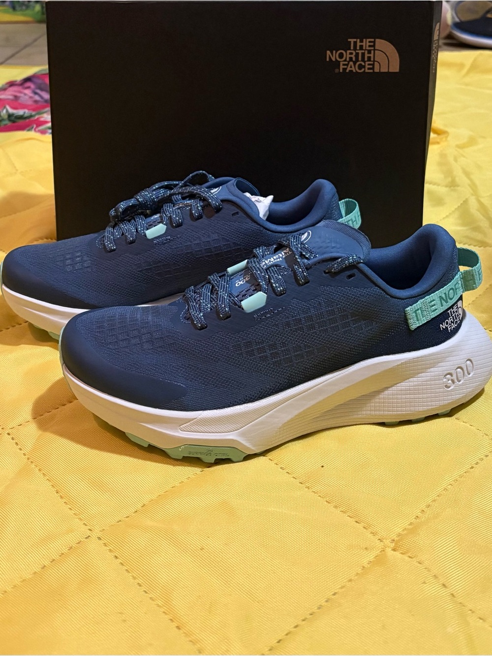 The North Face Women’s Blue Sneakers with Mint Accents
